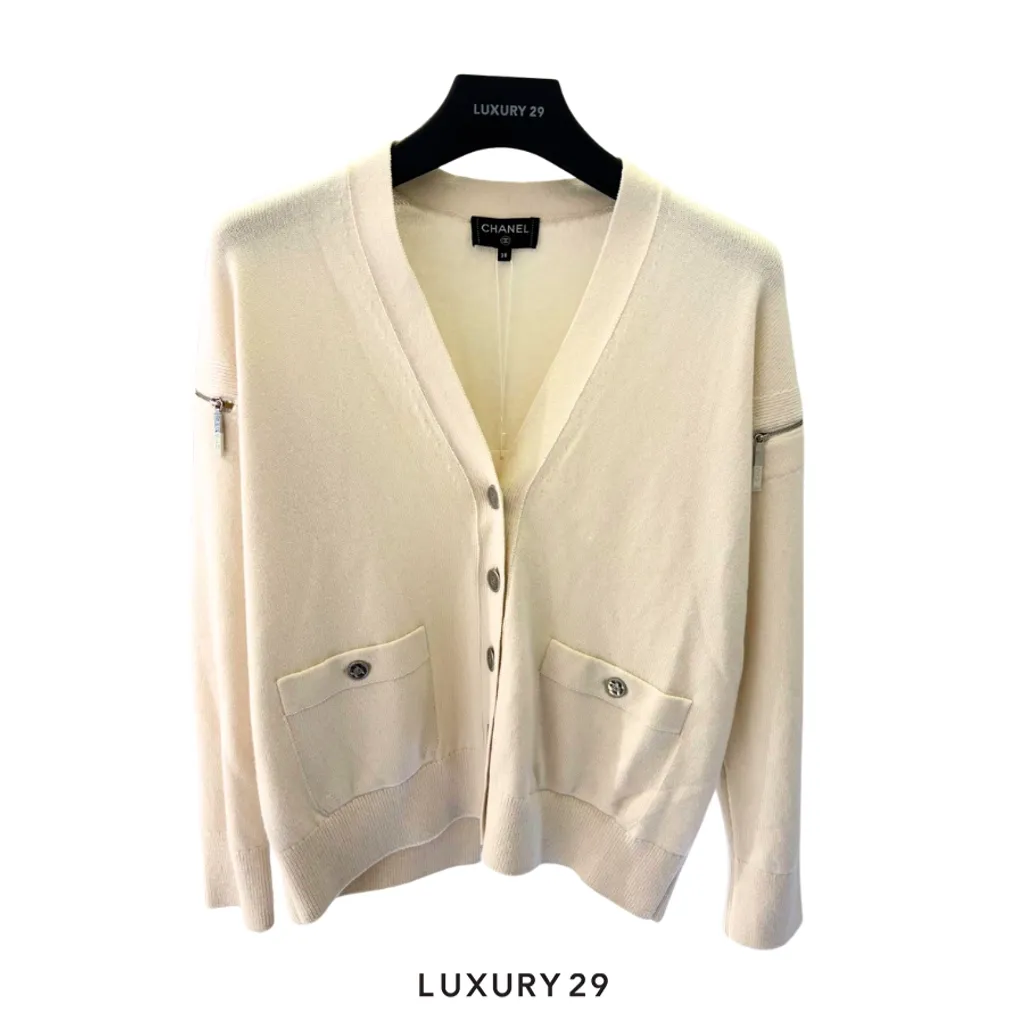 Chanel white knit cardigan V-neck front pockets with snap button closures and zipper accents on the shoulders/sleeves(S, White)