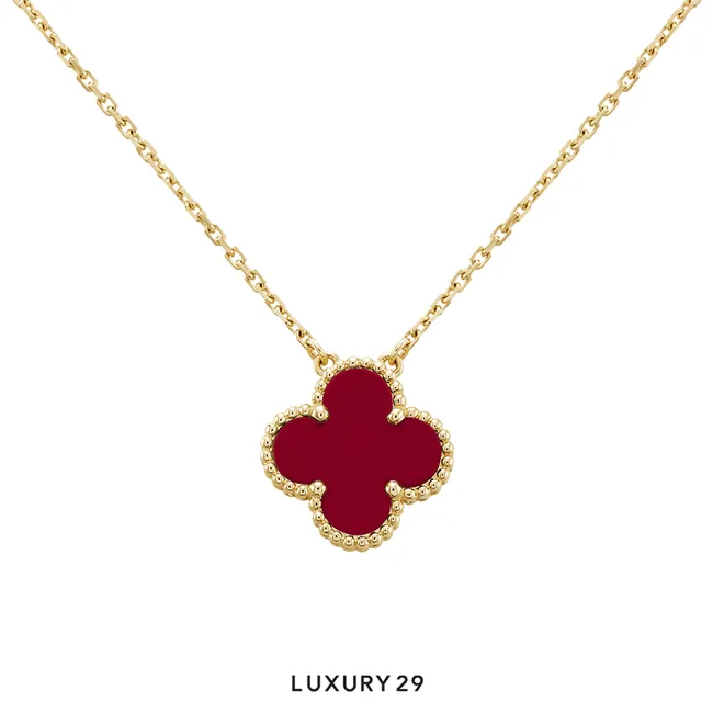 Van Cleef & Arpels Vintage Alhambra pendant, 18K yellow gold, carnelian