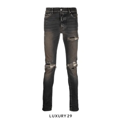 AMIRI distressed-effect slim-fit jeans Dark Indigo