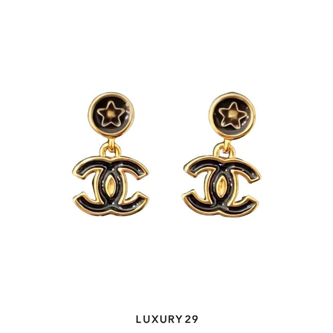 Chanel CC Metal Resin Star Logo Drop Earrings in Gold and Black