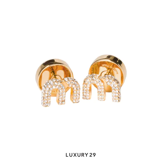 MIU MIU The iconic Miu Miu lettering logo Gold