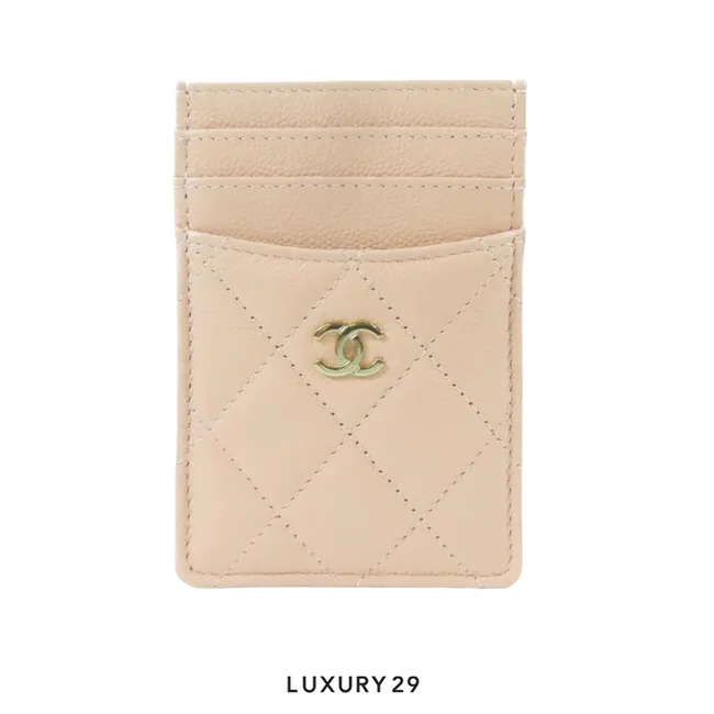 Chanel Classic Vertical Card Holder in light pink quilted caviar leather with gold-tone metal hardware