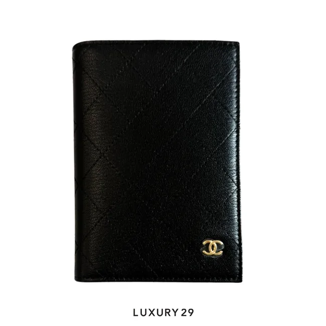 Chanel Classic Passport Case in black grained calfskin leather with a gold-tone metal CC logo
