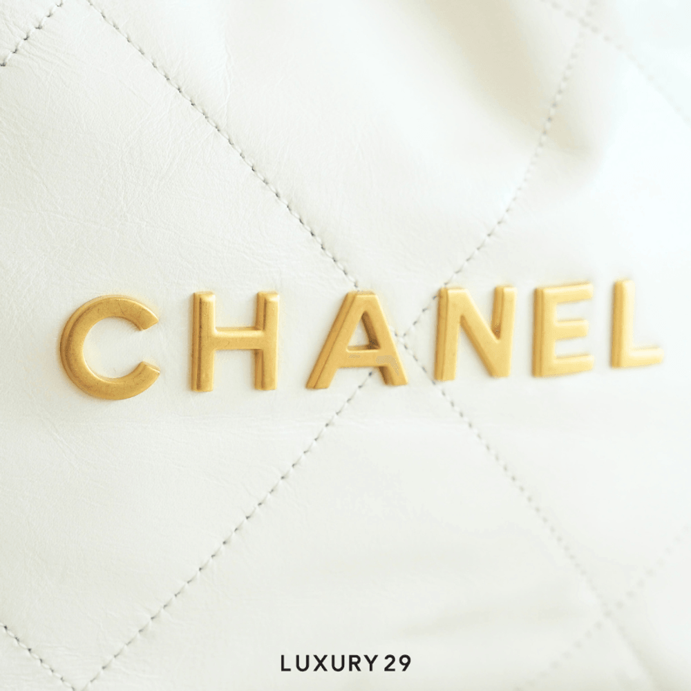 Chanel 22 Mini Handbag Shiny Calfskin & Gold-Tone Light Blue(Small, Blue)