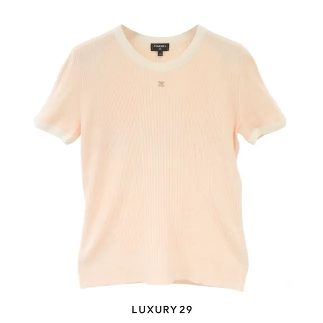 Chanel short-sleeved ribbed knit top in a light peach or cream color