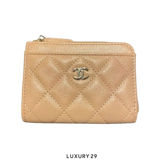 Chanel Quilted Caviar Leather beige with a gold CC logo