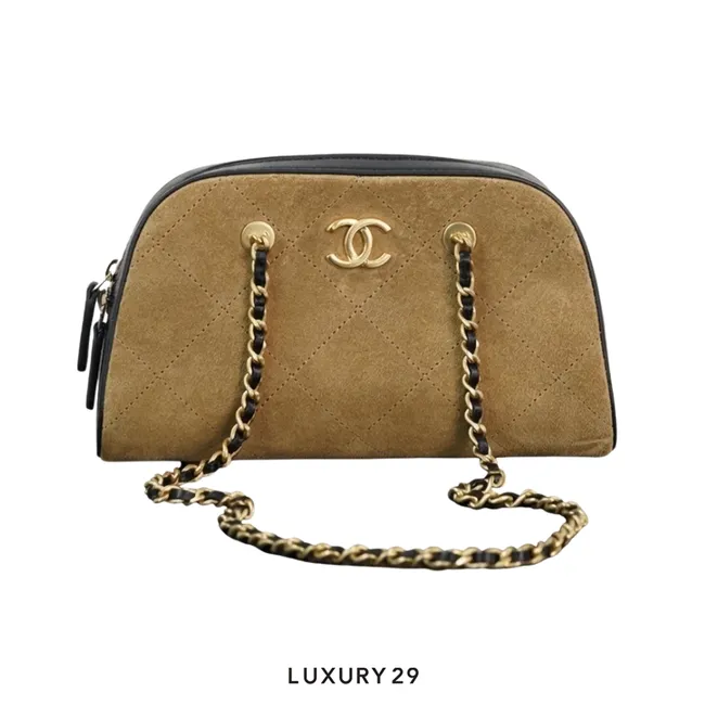 Chanel suede chain clutch bag in beige, featuring the iconic interlocking CC logo and signature quilted design