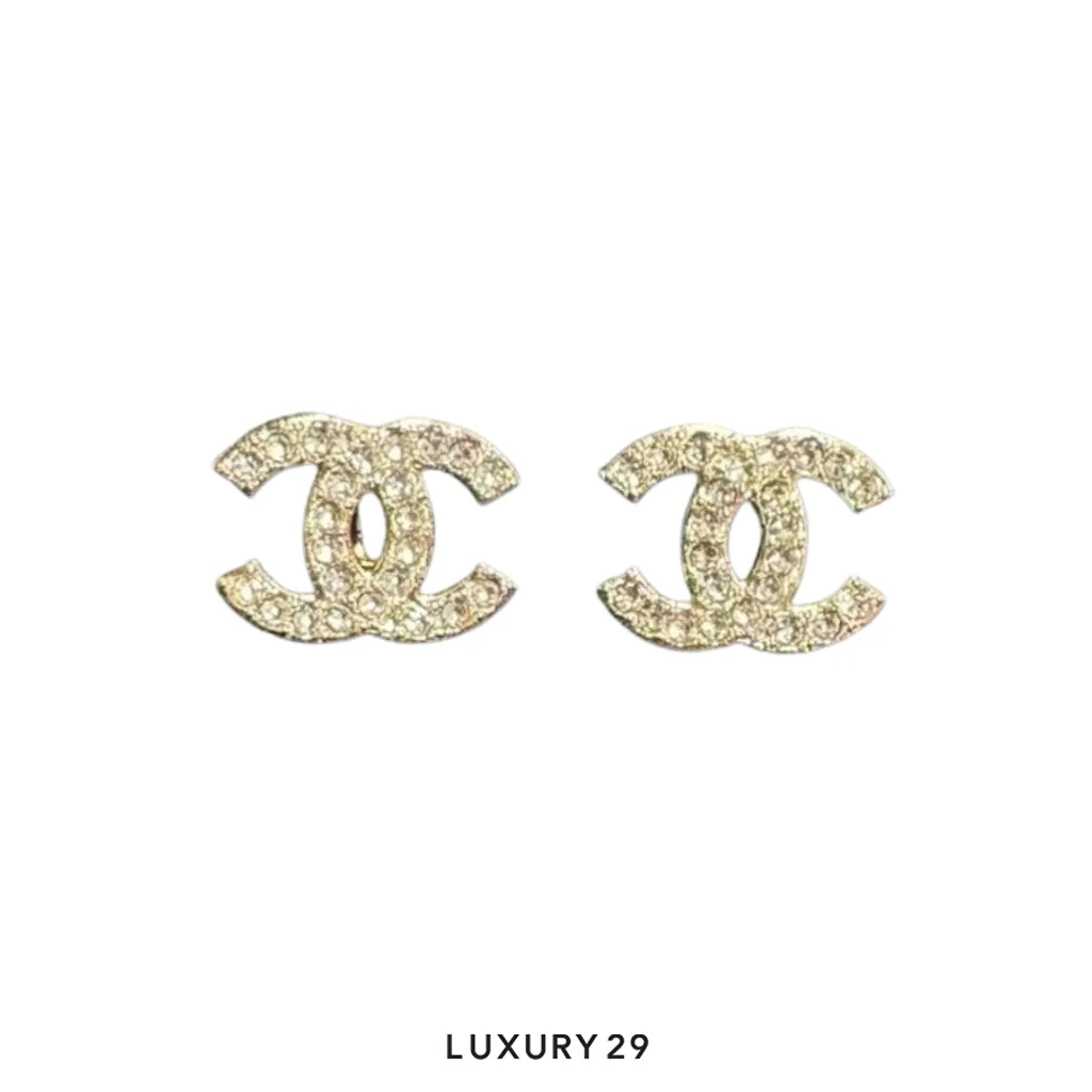 Chanel earrings featuring a gold-tone textured CC logo set with pearls and crystals(Free Size, Silver)