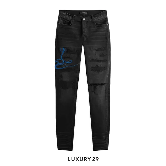 AMIRI CNY SNAKE ARCHIVAL JEANS