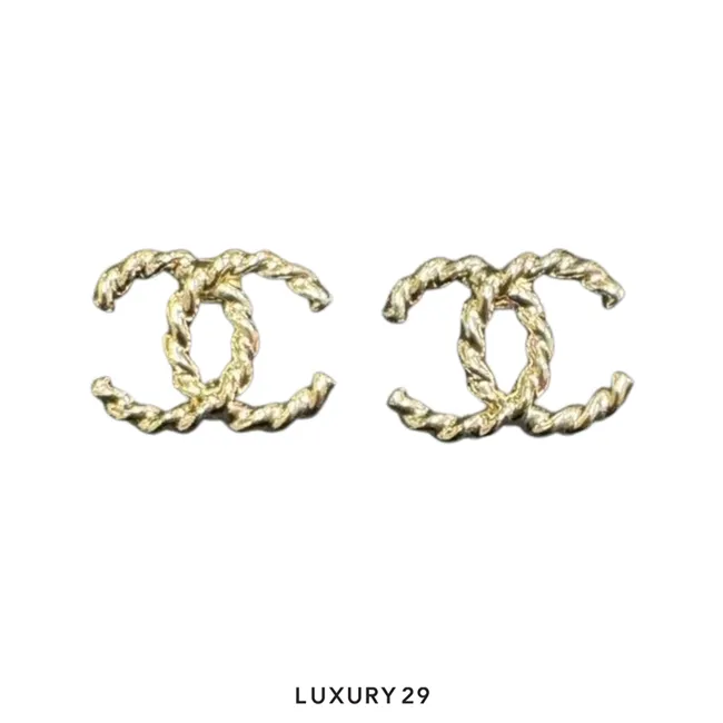 Chanel earrings feature a distinctive twisted texture on the iconic CC logo Gold Tone