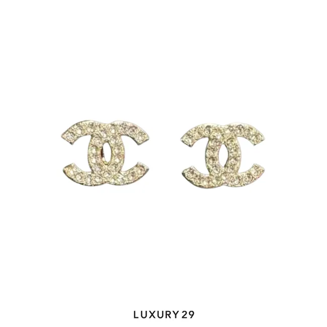 Chanel Crystal CC Earrings are crafted from polished gold metal and set with small sparkling crystals