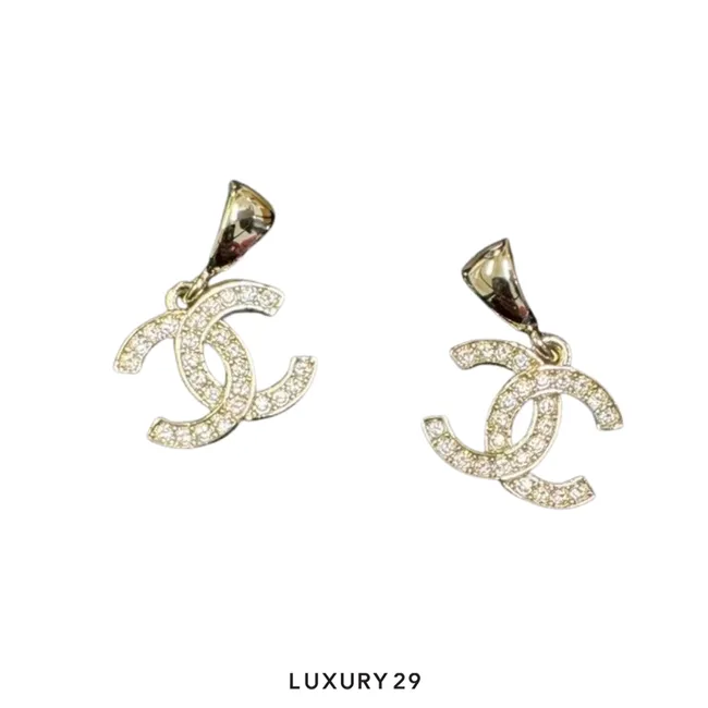Chanel CC logo earrings featuring crystal or diamond accents