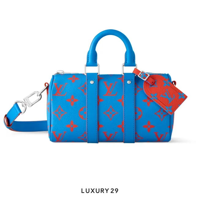 Louis Vuitton LV Keepall Bandouliere 25 Monogram Glow coated canvas Blue red