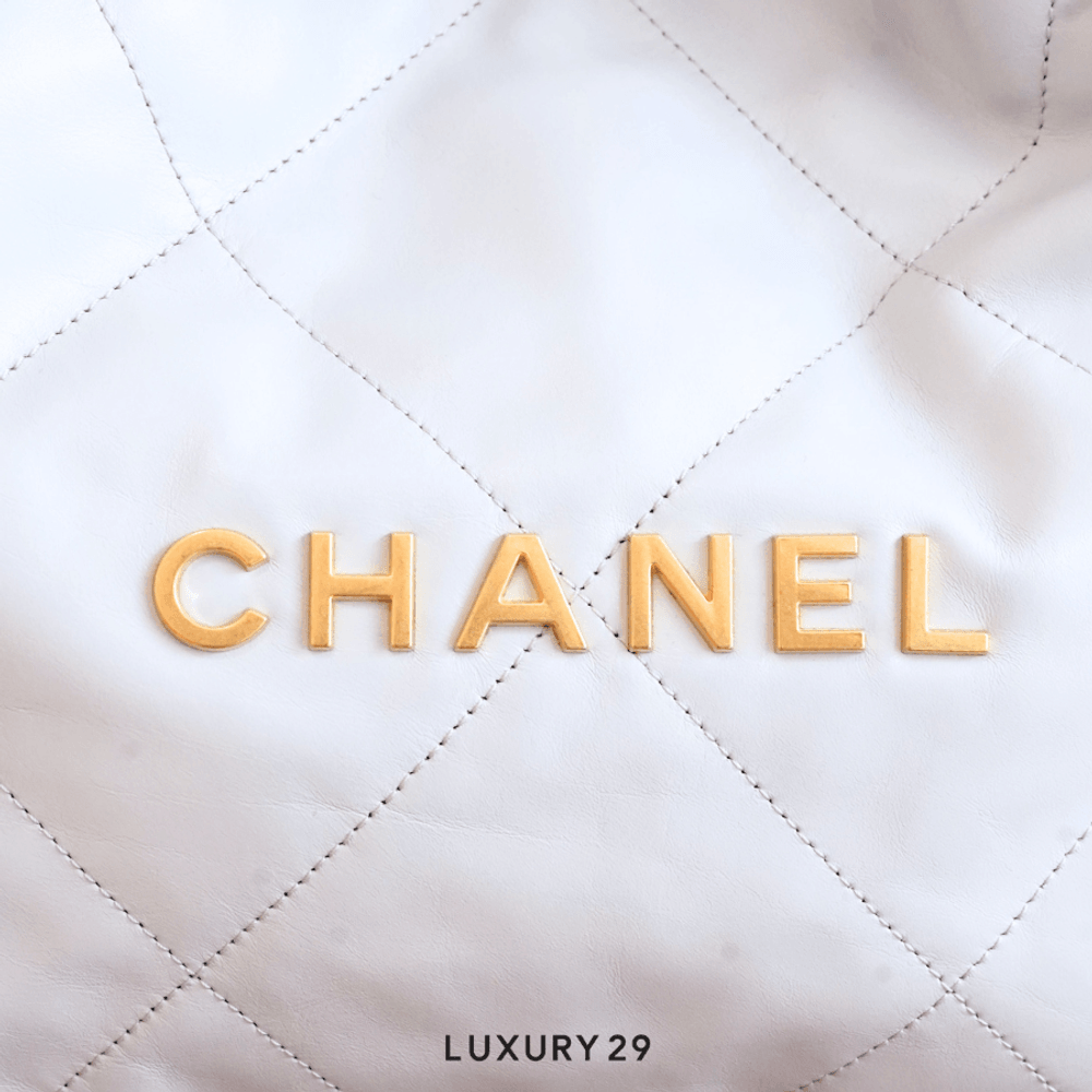 Chanel 22 Mini Handbag Shiny Calfskin & Gold-Tone Light Blue(Small, Blue)