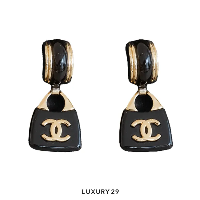 Chanel black gold cc acrylic drop earrings Black