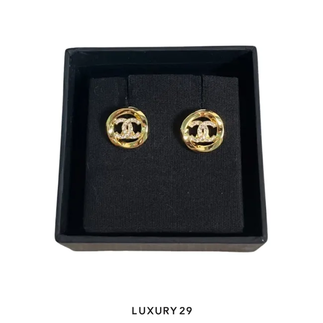 Chanel CC button earrings gold-plated finish with a twisted border and rhinestone-embedded interlocking logos